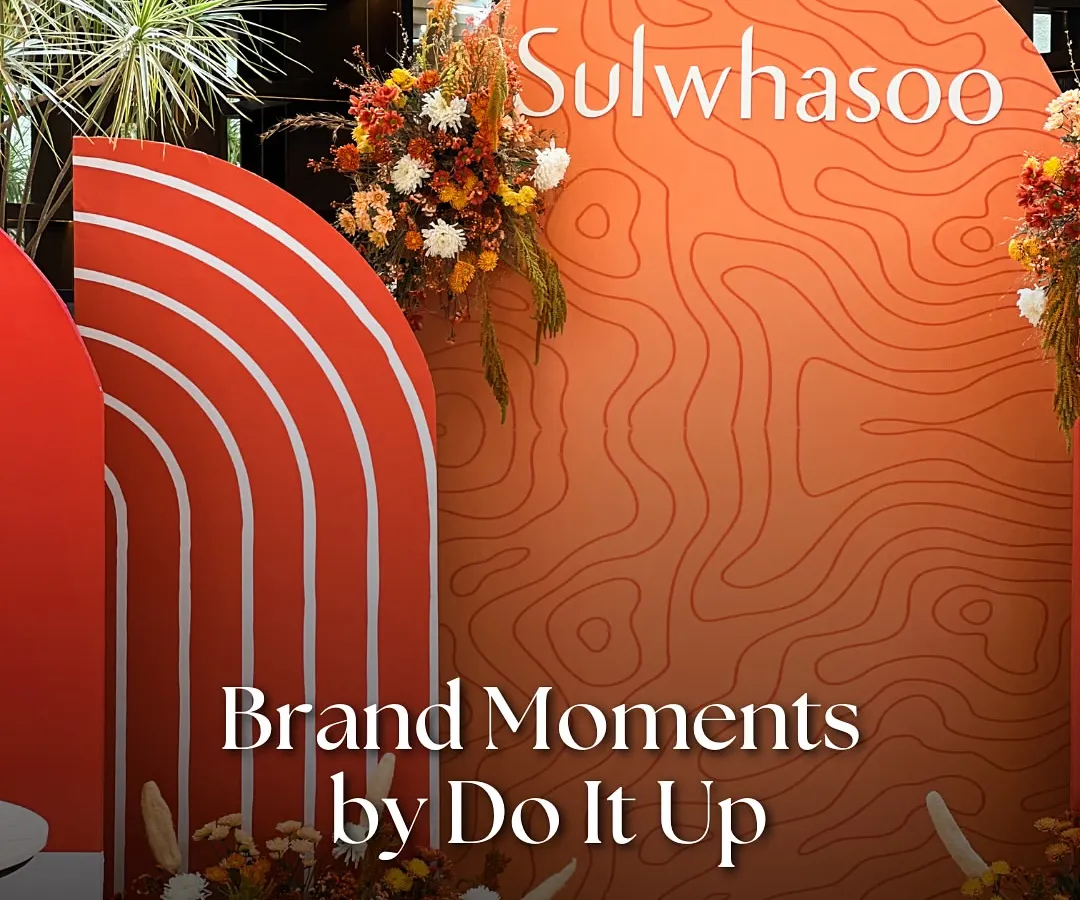 For the launch of the luxury beauty brand Sulwhasoo, we designed a custom backdrop that was a true reflection of their story. The warm, earthy tones and topographic line art speak to the brand's heritage and connection to nature, creating an artful and sophisticated brand activation.