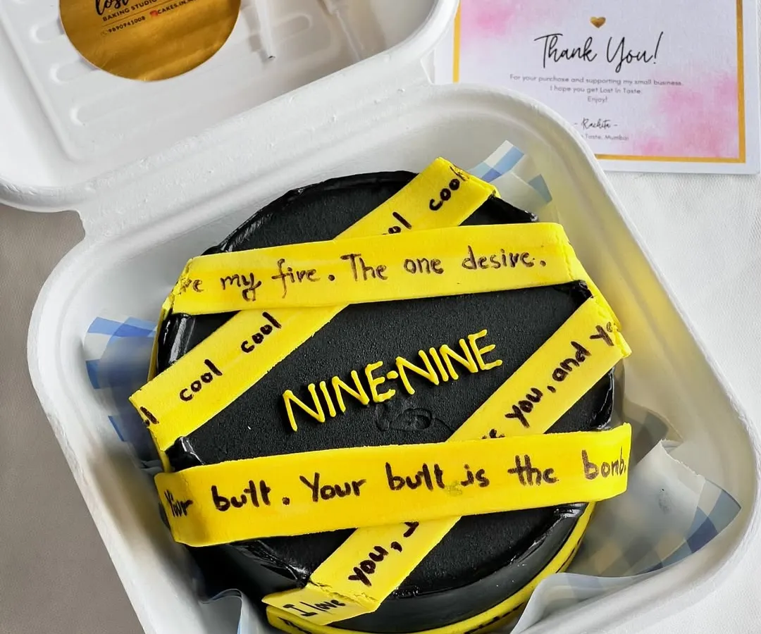 I love bringing your favorite pop culture moments to life. This Brooklyn Nine-Nine themed bento cake features iconic quotes on fondant tape, all piped on a striking black buttercream cake, perfect for a fan's birthday.