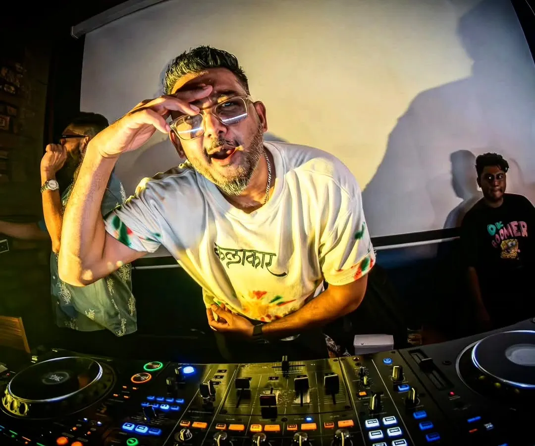 An artist's view from the DJ console. This fisheye shot captures the intensity and focus I bring to my live sets, connecting with the audience through music.