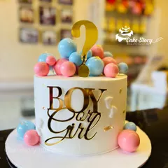 Another look at the elegant gender reveal cake, ready for the big surprise.