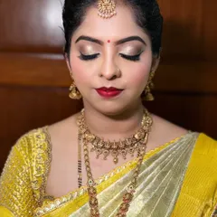 This shot highlights the soft, shimmering eyeshadow and perfectly blended base. My goal is to create makeup that looks flawless both in person and in photographs.