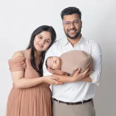 A new baby brings so much warmth and light. This beautiful family portrait with their newborn is full of happiness and love.