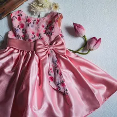 This design combines a classic floral print with the beautiful sheen of pink satin. I added a large, structured bow to create a statement piece that is both sweet and sophisticated, perfect for any special occasion.