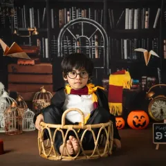 For the little wizard in your life, I create an immersive Harry Potter world. This detailed studio setup includes the iconic Gryffindor scarf, a wand, and a library backdrop to bring the magic of Hogwarts to life.