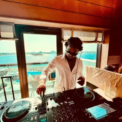 Getting set up for a daytime party with a stunning ocean view. My destination wedding DJ services cater to unique and beautiful locations.