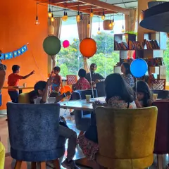 "Come let's become kids!" A snapshot from a children's birthday party at our cafe, filled with balloons, games, and happy faces.