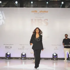 The showstopper look from the Wella showcase. I designed a powerful, confident makeup look with a subtle smokey eye and defined brows to match the boss-style black suit.