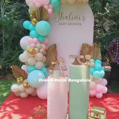 This pastel baby shower is a great example of how we mix colors and textures. The combination of mint, pink, and white balloons with gold palm leaves creates a chic and modern look. It was such a joy to create this for a regular client celebrating her fourth event with us.