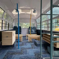 The interior of the 'Wonder on Wheels' bus, a pro-bono project we assisted with to create a mobile classroom. We designed a flexible interior with modular furniture to provide a safe and engaging learning environment for children of daily laborers.
