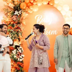 Engaging with guests at a 'Baby in Bloom' themed baby shower. I love making the father-to-be and other family members part of the fun and games.