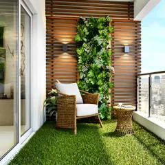 Even a small apartment balcony can become a personal retreat. Here, I used soft artificial grass, a comfortable wicker armchair, and a space-saving vertical garden mounted on a wooden slatted wall. This cozy balcony design provides a perfect spot for a morning coffee with a view.