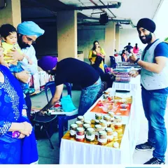 The whole family involved from the very beginning. Here's my son and husband helping out at an early stall.
