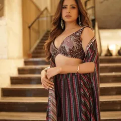 I created this complete look, including the haircut and caramel balayage, for the lovely Sargun Mehta. The face-framing layers and highlights are designed to enhance her features.