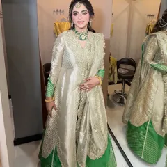 A full view of this beautiful Lohri outfit. The green and gold suit is so elegant, and the makeup was designed to match its regal feel.