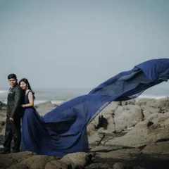 This flowing navy blue gown is a popular rental choice for pre-wedding shoots by the sea. I offer complete couple sets starting at affordable prices.