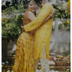 The pure, unadulterated joy of a Haldi ceremony. I focus on creating a fun, vibrant atmosphere where you and your loved ones can make memories like this.