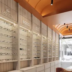 For 'The Brick Vault' retail project, we designed a striking terracotta vaulted ceiling that creates a warm, inviting atmosphere. This architectural feature, combined with clean, minimalist display units, establishes a unique and memorable brand experience for customers.