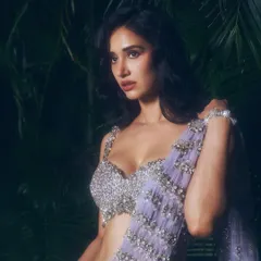 Another angle of this gorgeous look on Disha Patani. The makeup is designed to look flawless in low light, creating a sense of drama and romance.