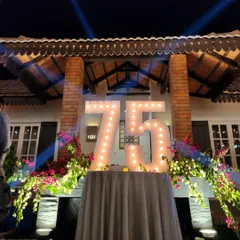 Milestone birthdays deserve to be in the spotlight. We designed these custom marquee light-up numbers for a 75th birthday party, creating a perfect photo opportunity and a focal point for the celebration.