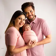 Your first family portrait is a memory you will treasure forever. I love capturing the connection and love between new parents and their precious baby, creating a timeless keepsake for your family.