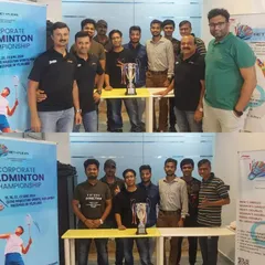 Team managers from various companies gather with the championship trophy before the Netflicks tournament begins. These pre event meetings are crucial for aligning on all logistical aspects.