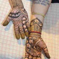 My bridal course prepares you to create complete and breathtaking designs for both hands. Here is an example of full coverage bridal mehndi featuring lotus and elephant motifs, showing the level of detail we will master together.