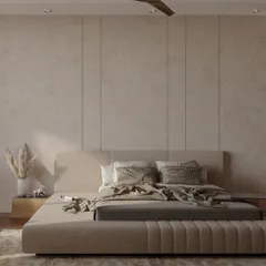 The bedroom in the Pune residence is a study in minimalist tranquility. I used a monochrome palette of soft beiges and textured wall panels to create a serene and restful atmosphere. The low-profile bed and uncluttered surfaces enhance the feeling of calm.