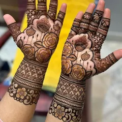 This beautiful Indo-Western design features large, shaded roses as the main element, combined with delicate lattice work on the wristband.