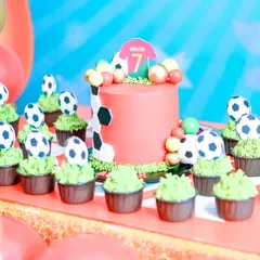 No detail is too small for our themed parties. Here are custom football cupcakes and a matching cake, perfectly coordinated with the party's theme.