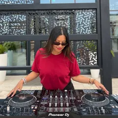 Posed and ready at my Pioneer DJ setup in Oman. I ensure my students get comfortable with industry standard equipment from day one.