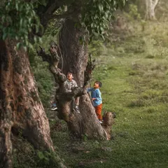 I love capturing the wild, wonderful chaos of childhood. These are the real, in-between moments: the explorations, the discoveries, and the pure joy of being a kid. This is a page from their storybook, a memory of a day spent climbing trees and searching for monkeys.