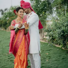 An embrace that says everything. I focus on capturing the genuine bond between my couples, like in this portrait where their traditional Marathi wedding attire adds to the richness of the moment.