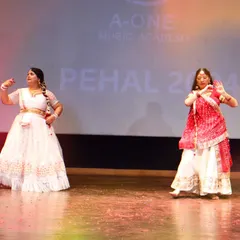 Two of our adult students gracefully performing a Kathak duet on the Pehal stage. Our annual event is a platform for dancers of all ages to showcase their talent and hard work.