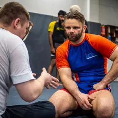 BJJ black belt Mike Murrell breaks down a technique for students during his seminar. His ability to teach complex concepts makes him a favorite guest instructor at our academy.