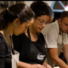 Students from The Hebrew University of Jerusalem getting focused on their culinary task. Our workshops are a great way for groups to immerse themselves in a new culture through its food.