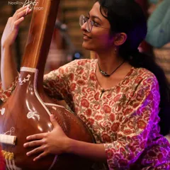 This is a calmer side of my music. Pictured with a tanpura, this image reflects my training in Indian classical music, a foundation that I bring to my devotional and semi-classical performances for more intimate or traditional gatherings.