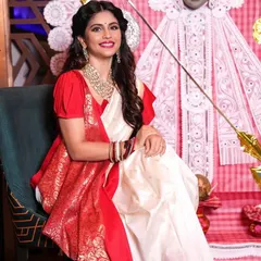 Another shot of the Bengali New Year look. The classic red bindi, statement jewelry, and the elegant drape of the saree are all key elements that I ensure are perfect for an authentic traditional appearance.
