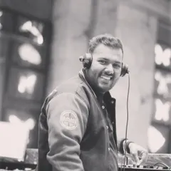 A candid moment behind the decks. My passion for all kinds of music, from House to Bollywood, is what drives me at every event, whether it's a wedding or a club night.