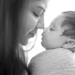 A tender nose-to-nose moment between mother and newborn. I focus on capturing these quiet, intimate connections that you'll want to remember forever.