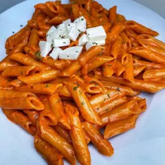 My Penne Pasta is cooked in a rich and creamy tomato sauce and topped with fresh paneer cubes. It's a comforting dish that's perfect for a quick and satisfying meal.