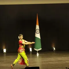 Performing for the Honorable Prime Minister Shri Narendra Modi ji in Paris. Standing between the flags of India and France, I felt immense pride in representing my country's rich cultural heritage.