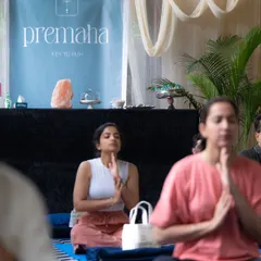 Participants in a state of prayer and meditation during our Premaha workshop. It doesn't matter your experience level; what matters is showing up with an open heart.