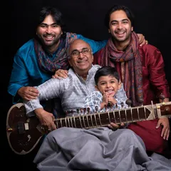 A family portrait celebrating Gurupoornima, a day to honour our teachers. My father's guidance has been invaluable, and I strive to pass on his wisdom and passion for music to all my students.