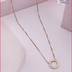 The essence of quiet luxury. This delicate Circle of Eternity pendant in rose gold is a testament to timeless design, perfect for adding a touch of grace to your daily ensemble or for elegant layering.