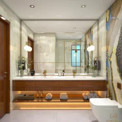 I believe bathrooms should be personal sanctuaries. This spa-style master bathroom features a floating dual vanity with warm under-lighting, a striking blue and gold agate-patterned wall, and a spacious glass shower enclosure for a truly luxurious feel.
