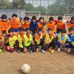 The full squad after a friendly match. Win or lose, we stand together as a team. These experiences build character and unity.