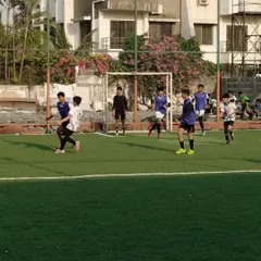 Our players setting up an attack, demonstrating field awareness and positioning during a competitive match.