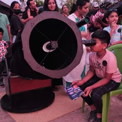 A young explorer gets a closer look at the cosmos through our powerful telescope. Our stargazing camps are all about sparking curiosity and making the vast universe feel a little closer.