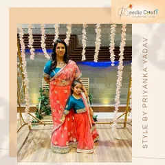 There's nothing more special than matching with your little one. I designed this mother-daughter ethnic wear set, coordinating the colors and embroidery on the lehenga and saree for a beautiful, unified look at a family wedding.