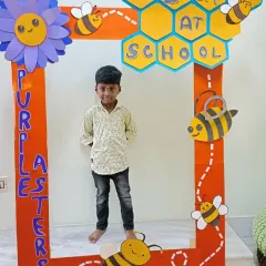A proud moment on the first day of school. We welcome each new student with a special photoshoot to make them feel celebrated.